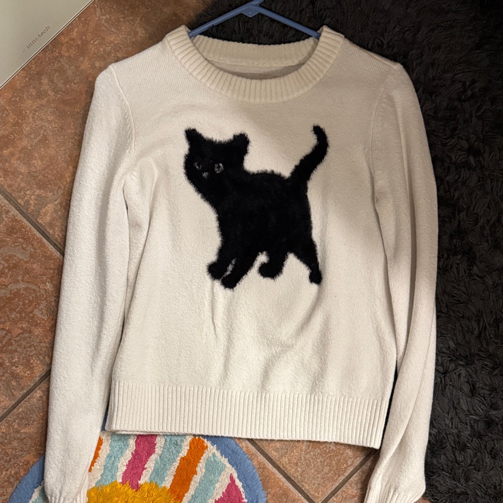White Sweater with Black Fuzzy Cat Graphic